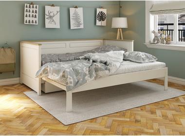 Bed frame against a wall with window frame