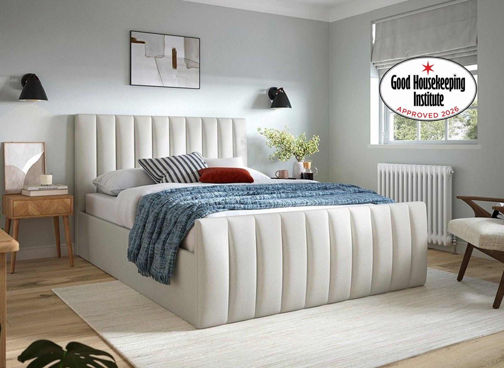 A bed in a bedroom with background