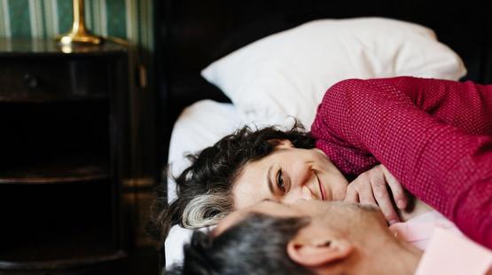 Couple sleeping next to each other