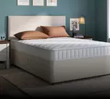 Image of a white sofa bed