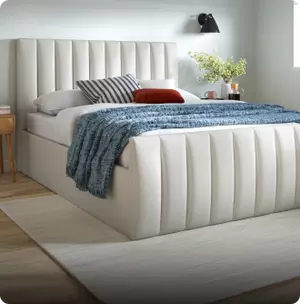 Davies white ottoman bed in a bedroom setting.