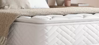 Corner of a mattress as a background image.