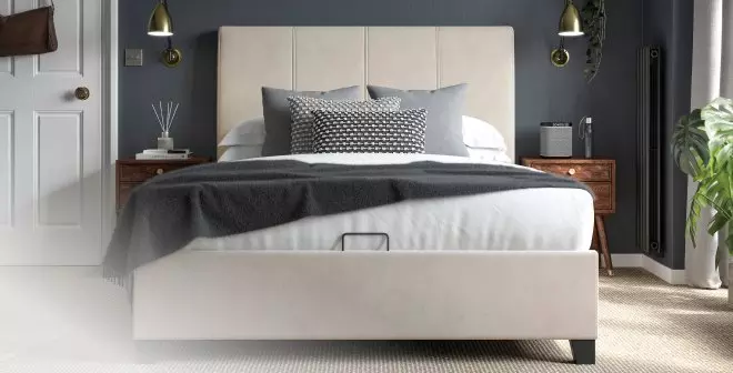 White Francesca ottoman in a bedroom setting.
