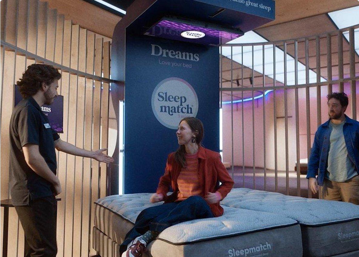 A dreams-workshop bed frame with a dreams-workshop mattress, set in a bedroom
