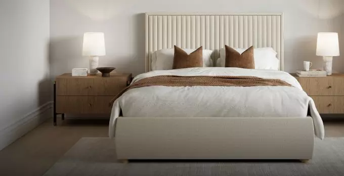 Cream ottoman bed frame in a bedroom setting.