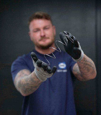 A sealy bed frame with a sealy mattress, set in a bedroom